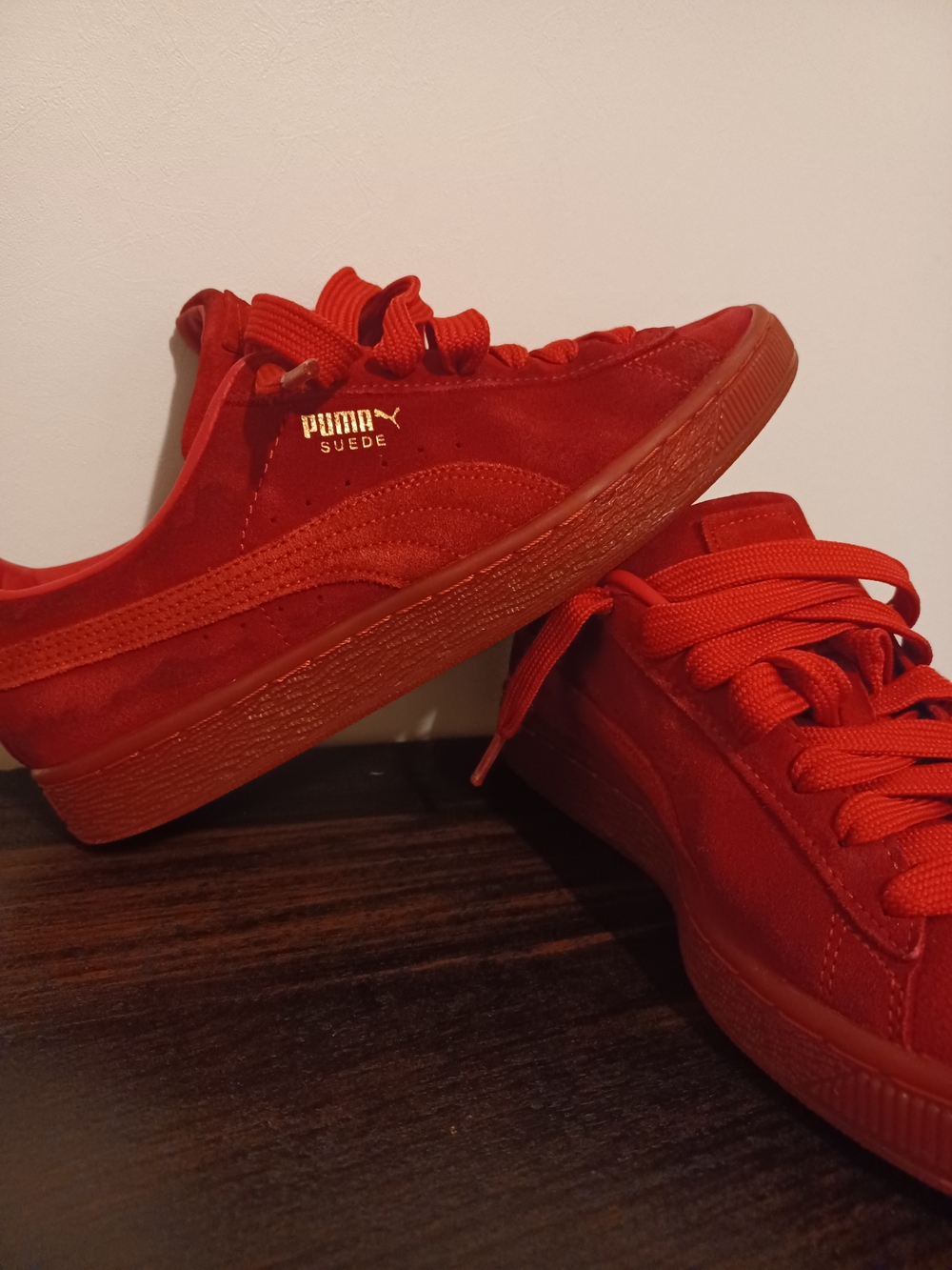Puma Suede Low-Top Sneakers in Bright Red with Gold Logo